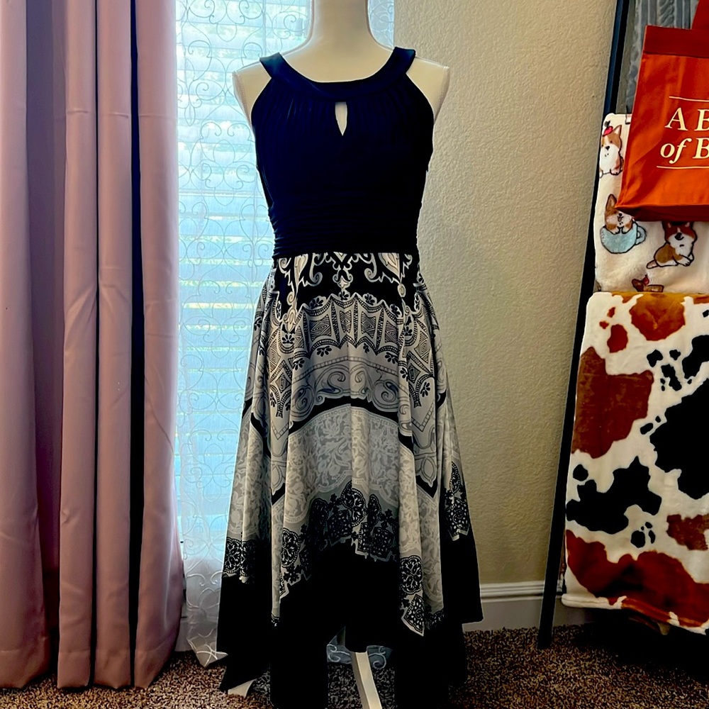 Ladies formal dress. Handkerchief hem. Beautiful fit. Black top and multi skirt.